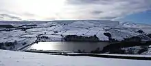 Holme Moss, above Digley Reservoir and  Holme Village (February 2009)