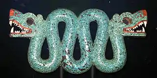 Double-headed serpent; 1450–1521; Spanish cedar wood (Cedrela odorata), turquoise, shell, traces of gilding & 2 resins are used as adhesive (pine resin and Bursera resin); height: 20.3&nbsp;cm (8.0&nbsp;in), width: 43.3&nbsp;cm (17.0&nbsp;in), depth: 5.9&nbsp;cm (2.3&nbsp;in); British Museum