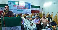 Dr. Umer Thasneem speaking on  Sir Syed Day at AMU Malappuram Campus in 2019.