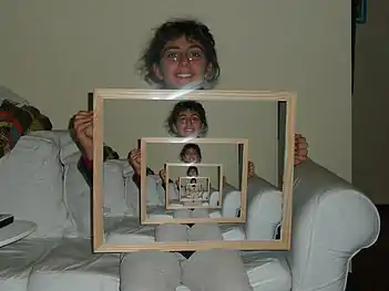Droste effect by image manipulation (using GIMP).