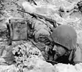 Soldier uses an EE-8 field telephone