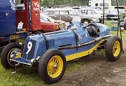 Bira's third ERA, chassis R12B Hanuman&nbsp;II, in the final Thai racing scheme of pale blue with yellow chassis rails and wheels. The Thai flag is placed in the subsidiary position, at the left leading edge of the car's bonnet, to represent the driver (it is also on the tail)