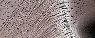 Close, color view of the end of gullies in Russell Crater, as seen by HiRISE