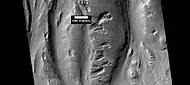 Erosion of crater deposit in Lucus Planum, as seen by HiRISE under HiWish program.