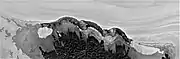 North Polar Scarp in Abalos Undae with Basal Exposure and Dunes in black and white