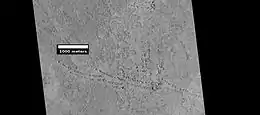Rootless Cones, as seen by HiRISE under HiWish program.  These group of rings or cones are believed to be caused by lava flowing over water ice or ground containing water ice.  The ice quickly changes to steam which blows out a ring or cone.