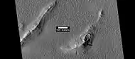 Layers and dark slope streaks in Lycus Sulci, as seen by HiRISE under HiWish program