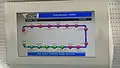 TV screen in ETS Train 203 displaying the stops from Padang Besar to Gemas.