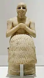 The Statue of Ebih-Il; circa 2400 BC; gypsum, schist, shells and lapis lazuli; height: 52.5 cm