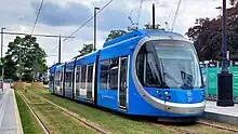 Urbos 3 tram in West Midlands Metro blue livery at Edgbaston Village tram stop
