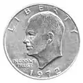 $1 coin. Dwight D. Eisenhower, class of 1915 on obverse. The reverse is based on the Apollo 11 mission patch designed by Michael Collins, class of 1952.