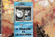 Image 21"El desastre es la colonia" (the disaster is the colony), words seen on light meter six months after Hurricane Maria (from Culture of Puerto Rico)