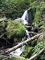 Rocky outcroppings, hanging valleys, and overflowing streams complicated passage through the rough terrain.