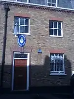 The entrance on Three Kings Yard
