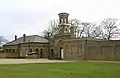 Offices and Guard House flanking the clock tower (1856)
