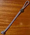 Soft shackle with [diamond knot] head, and [turks head] collar  open