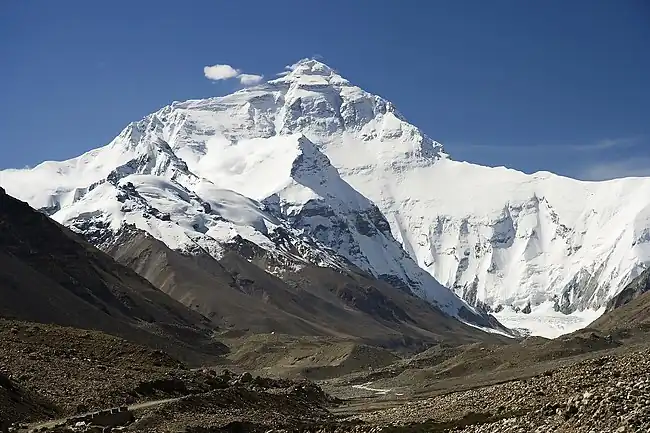 Image 12Mount EverestPhoto credit: Luca GaluzziThe north face of Mount Everest, as seen from Tibet. Everest is the highest mountain on Earth, as measured by the height of its summit above sea level, which is 8,848 metres (29,029 ft). In 1865, Everest was given its official English name by the Royal Geographical Society upon recommendation of Andrew Waugh, the British Surveyor General of India at the time.More selected pictures