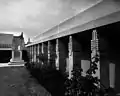 Part of central courtyard and overhanging with stairway leading to roof terrace, 1921