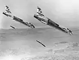 U.S. Navy F-8J Crusaders drop bombs at Chocolate Mountain Aerial Gunnery Range (1972)