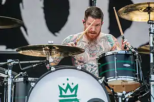 Hurley performing with Fall Out Boy in 2014
