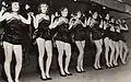 Female performers dancing
