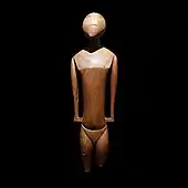 Dinonga eidu (idol); circa 1800; wood; height: 35&nbsp;cm (13.mw-parser-output .frac{white-space:nowrap}.mw-parser-output .frac .num,.mw-parser-output .frac .den{font-size:80%;line-height:0;vertical-align:super}.mw-parser-output .frac .den{vertical-align:sub}.mw-parser-output .sr-only{border:0;clip:rect(0,0,0,0);clip-path:polygon(0px 0px,0px 0px,0px 0px);height:1px;margin:-1px;overflow:hidden;padding:0;position:absolute;width:1px}3⁄4 in.); from the Caroline islands; Musée du quai Branly (Paris)