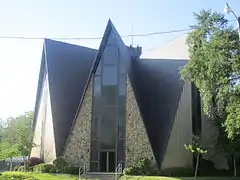 The unusually configured First Church of God in Bastrop is located across the street from the Morehouse Parish Library.