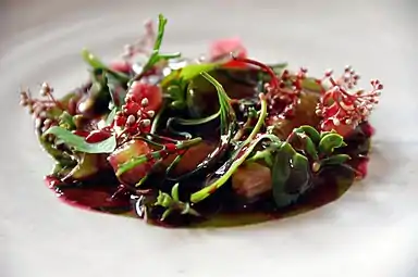 Raw prawns with seaweed, rhubarb and herbs.