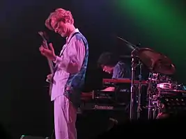 The Flower Kings performing in 2004 (Roine Stolt and Tomas Bodin pictured)