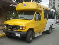 This is an old Translink Bus. HandyDART buses are now a different style and have different colors
