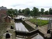 Castle Mills Lock and Basin, near the Foss Barrier and the confluence with River Ouse.mw-parser-output .geo-default,.mw-parser-output .geo-dms,.mw-parser-output .geo-dec{display:inline}.mw-parser-output .geo-nondefault,.mw-parser-output .geo-multi-punct{display:none}.mw-parser-output .longitude,.mw-parser-output .latitude{white-space:nowrap}53°57′15″N 1°04′41″W﻿ / ﻿53.954078°N 1.077944°W﻿ / 53.954078; -1.077944