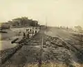 Galveston Electric Co. tracks adjacent to Hotel Galvez (in background) after the 1915 Galveston Hurricane