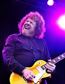 Moore performing in 2008