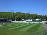 MOSiR Stadium with the main stand on the left.