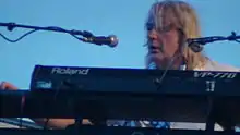 Geoff Downes plays behind a Roland keyboard