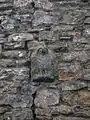 The 'Eagle' from Giffen Castle, now in the lower gable wall of Giffen mill