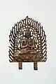 Unified Silla dynasty. Of the ten Buddha plates excavated from Wolji, Gyeongju. Two spikes of different lengths extend from the bottom of the pedestal, indicating that the plate was once fixed onto something.