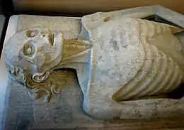 The early, influential example; gisant of Guillaume de Harsigny, c. 1394. Musée d'art et d'archéologie de Laon, France