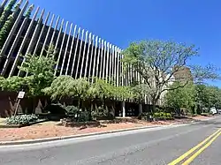 The Great Neck Plaza Village Hall and Parking Garage complex on June 17, 2021. The Village Hall entrance is visible towards the center.