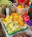 Sour unripe mangoes eaten with shrimp paste, salt, chili, vinegar, and/or soy sauce in the Philippines