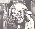 The starboard 12-inch (305&nbsp;mm) Mark VIII gun in one of the turrets aboard the British battleship HMS Caesar. The gun's breech is closed.