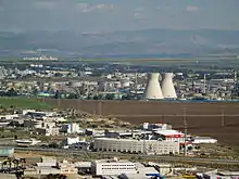 Image 80The oil refinery in Haifa, Israel, is capable of processing about 9 million tons (66 million barrels) of crude oil a year. Its two cooling towers are landmarks of the city's skyline. (from Oil refinery)