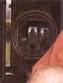The mirror behind the Virgin