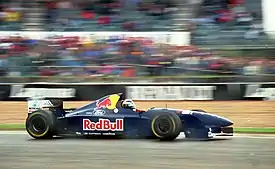 Heinz-Harald Frentzen driving the C14 at the 1995 British Grand Prix.