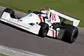 1975 Hesketh 308C driven at Barber Motorsports Park. The car lacked any sponsorship and featured the flags of England and Scotland