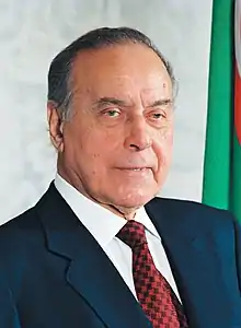 Photo of Aliyev wearing suit and tie