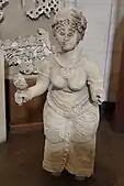Semi-nude female figure
