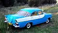 1961 Holden Special (FB) sedan (model 225), Twilight Turquoise with Grecian White flash.