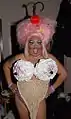 Holy McGrail is a female queen and nightlife socialite in San Francisco; making her debut in 2005, Holy is known for her outrageous self made wigs, signature makeup and drag performances