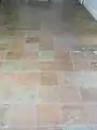 Acid-stained decorative concrete floor in basement